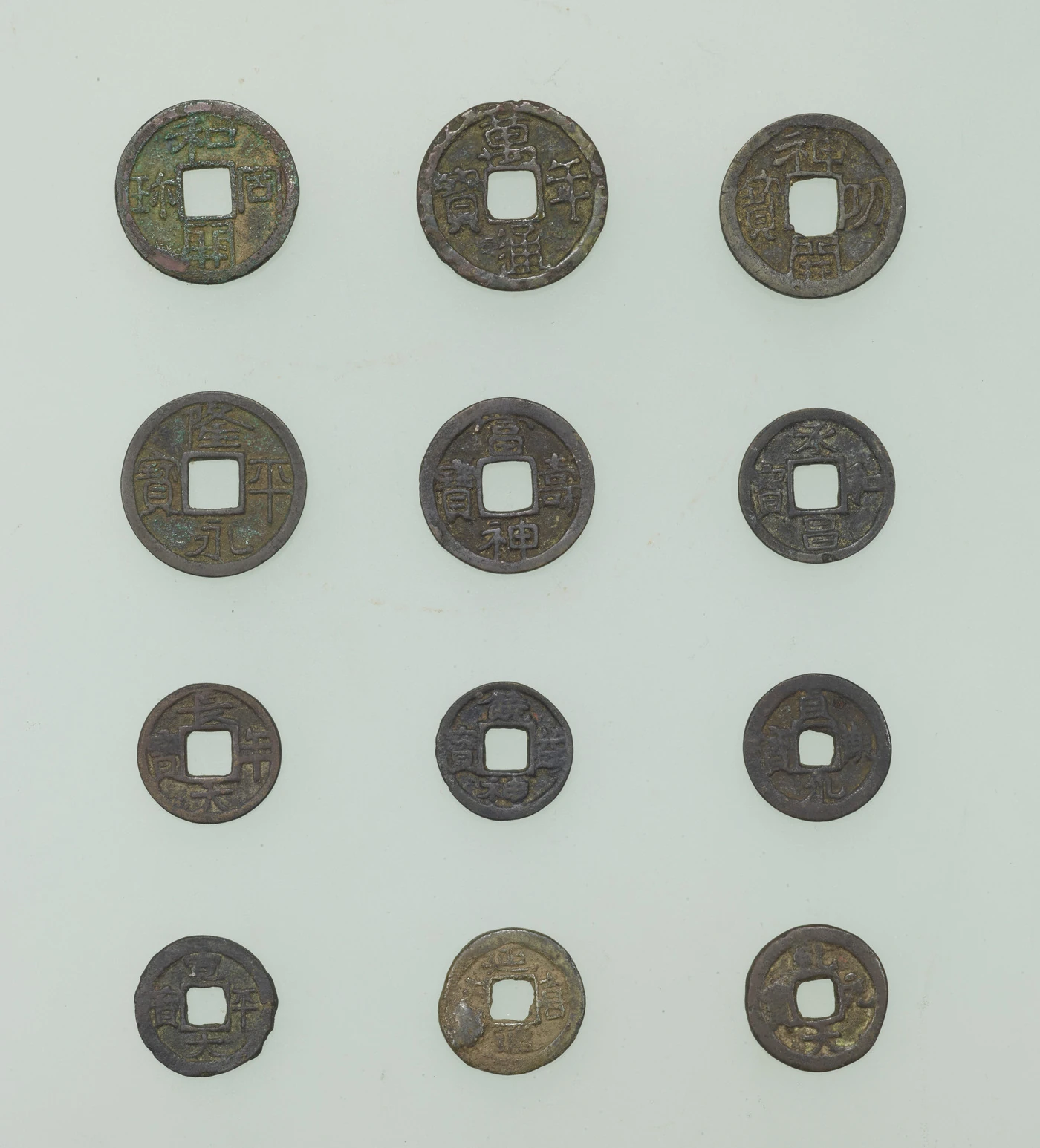 A Tokyo National Museum group illustrating the twelve ancient court coin types