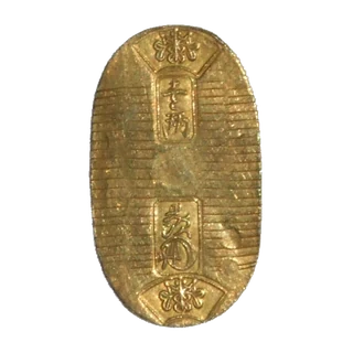 Thumbnail: Obverse and reverse of a representative Man’en Koban, retaining its oval form